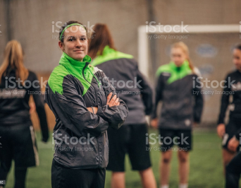 Photo of someone kicking a soccer ball