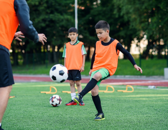 Photo of a boy playing soccer